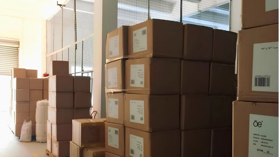 Jerryshoes warehouse and shipment area with stacked boxes ready for global delivery